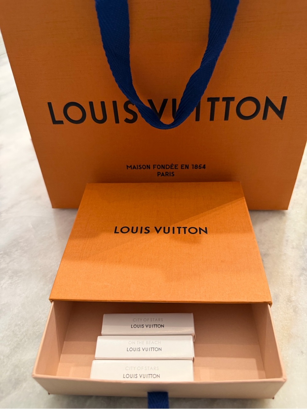 Louis Vuitton Box and Shopper’s Bag Bundle